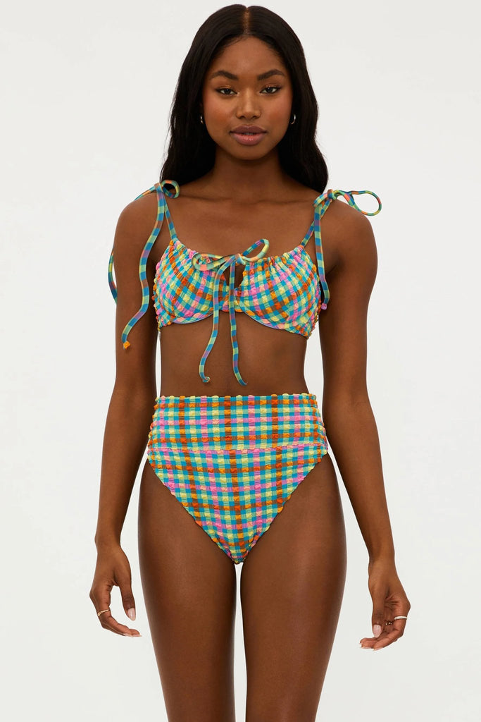 Model wearing the top and bottom of the beach riot women's highway bikini set in sunny side gingham print