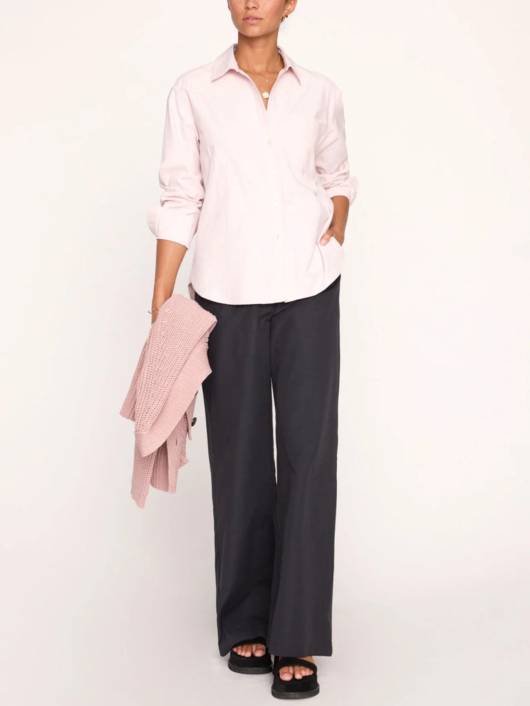 Brochu Walker The Everyday shirt in rose quartz. Light pink women's button down styled on model with black leather pants.