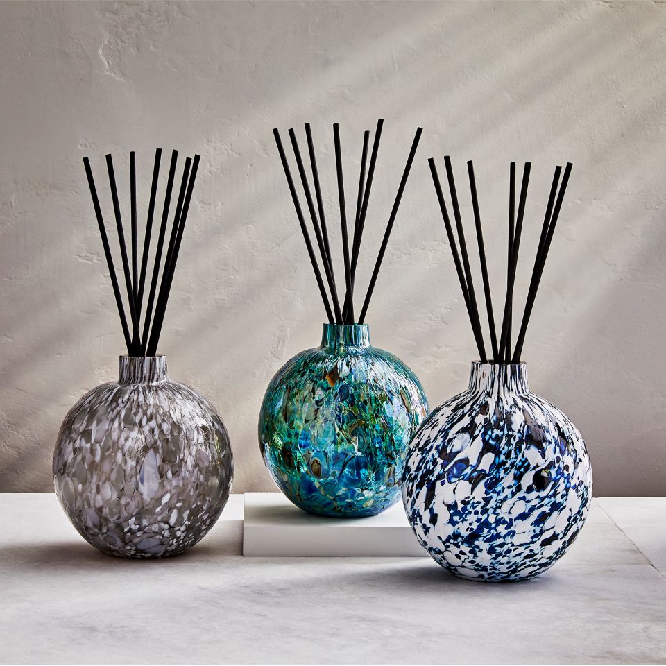 three lafco absolute diffusers in hand-blown glass vessels